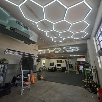 Hexagon LED work lighting over the detail bay at Canon Auto Tinting Plus