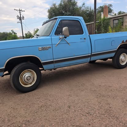 Classic blue Dodge Ram pickup with new window tint
