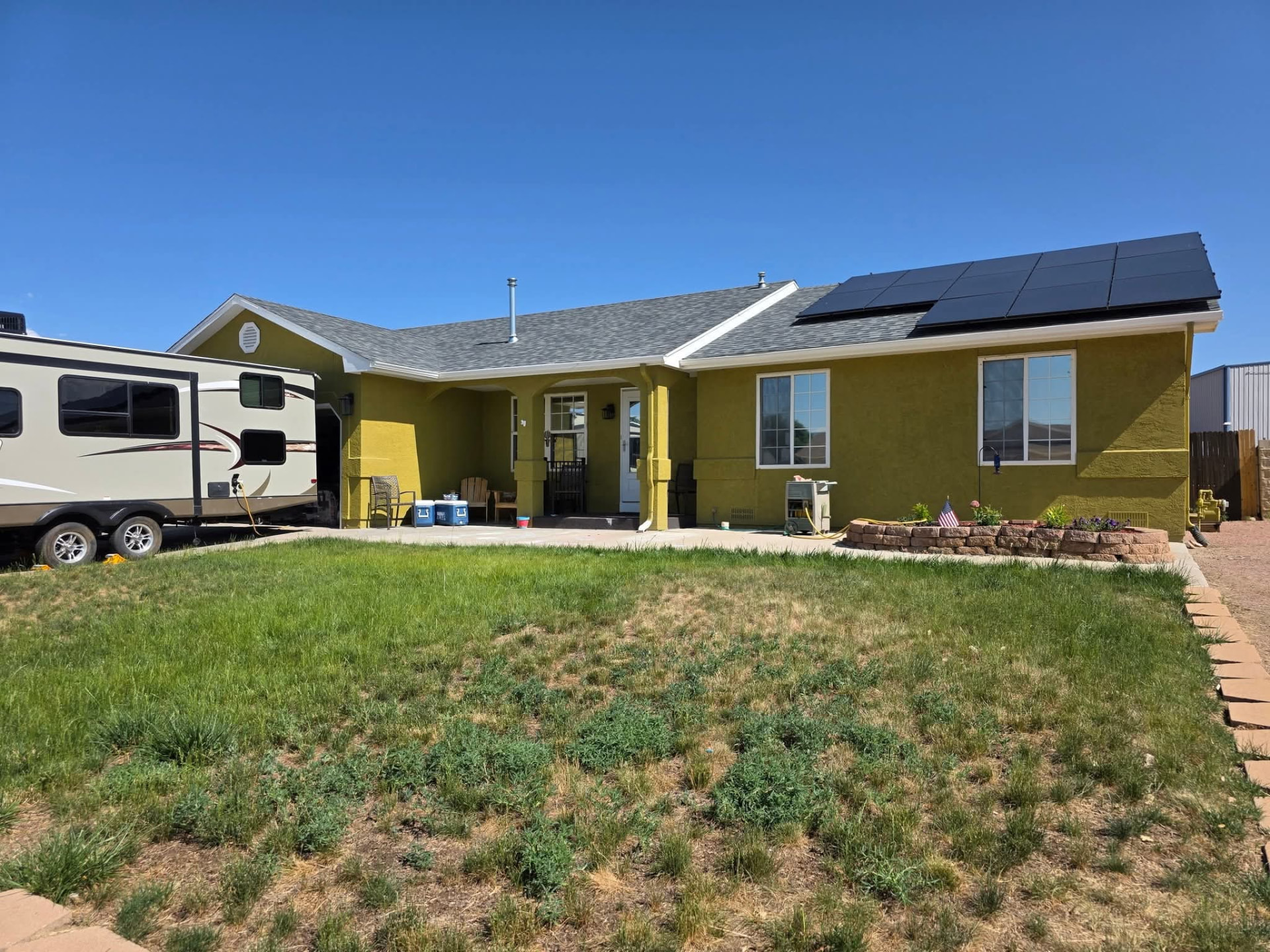 Single-story Cañon City home with tinted front windows