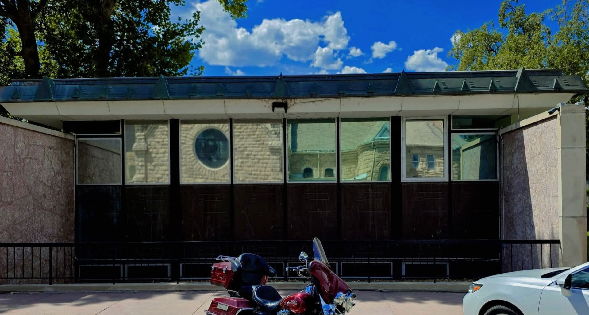 Cañon City commercial building with dark tinted storefront glass